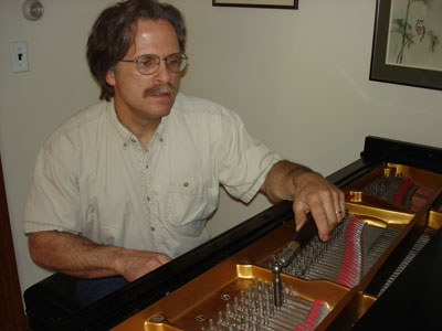 Louis Gentile tuning a piano