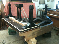 New legs and lyre being fitted